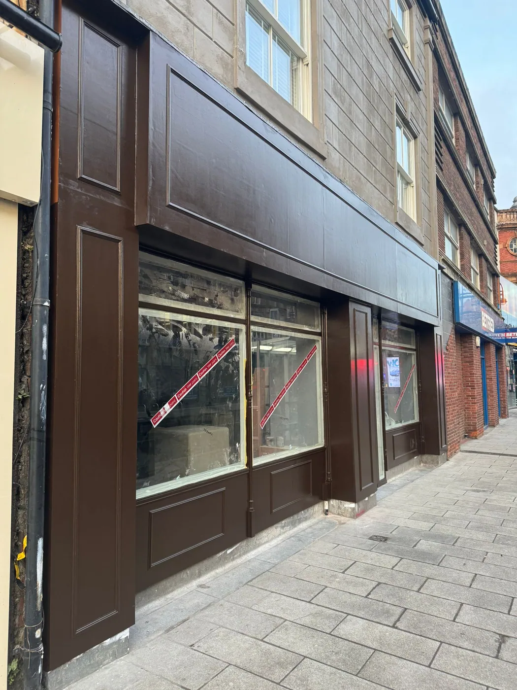 Completed commercial shopfront installation by Shutter and Shopfront UK